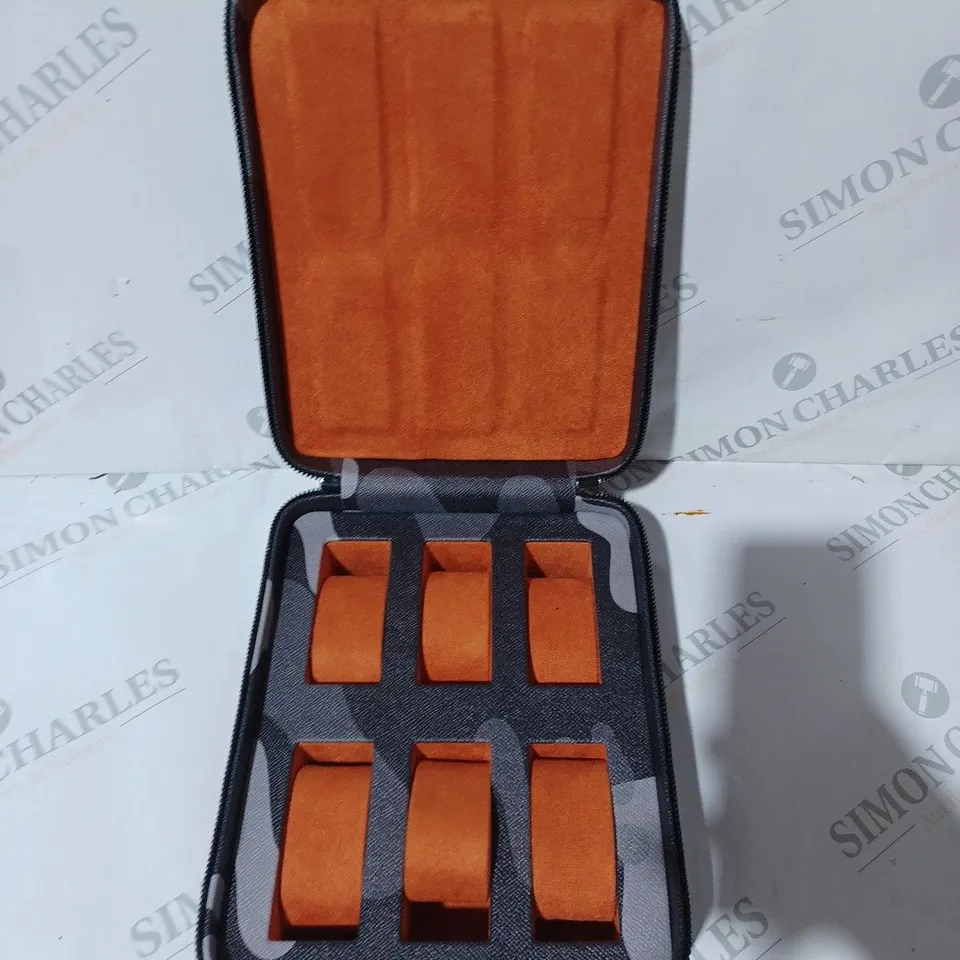 UNBRANDED WATCH STORAGE CASE IN URBAN CAMO PATTERN W. ORANGE INTERIOR