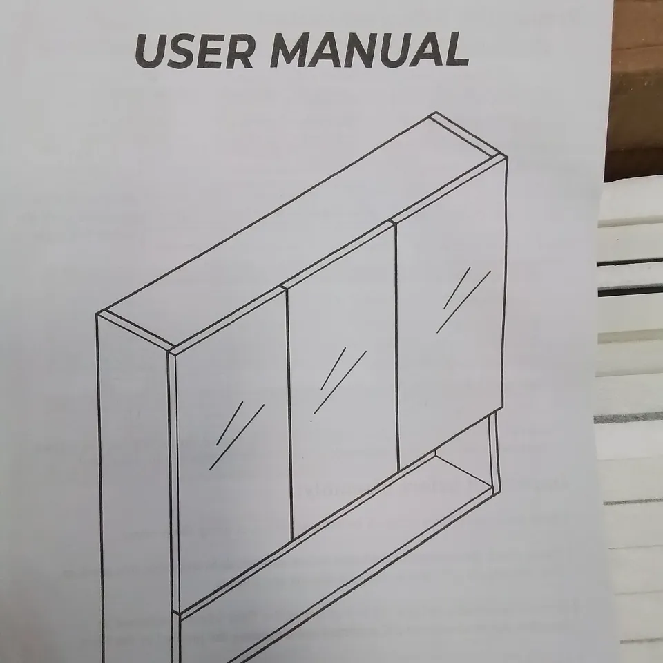 A BOXED 3 PANEL MIRRORED BATHROOM CABINET IN WHITE