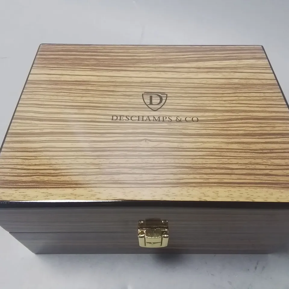 DESCHAMPS & CO STAINLESS STEEL SKELETON DIAL GENTS WATCH WITH AUTOMATIC MOVEMENT AND RED RUBBER STRAP IN WOODEN GIFT BOX