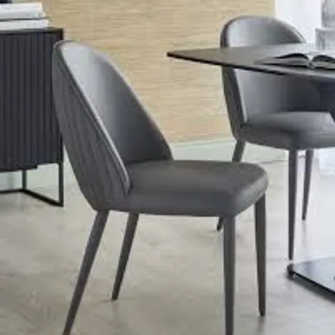 BOXED PAIR OF DANETTI SAYLOR DARK GREY FAUX LEATHER DINING CHAIRS