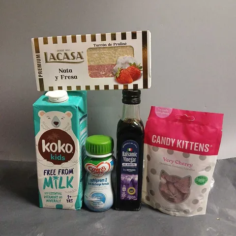 TOTE OF APPROX 11 ASSORTED FOOD ITEMS TO INCLUDE - KOKO FREE FROM MILK , CANDY KITTENS , BALSAMIC VINEGAR ETC