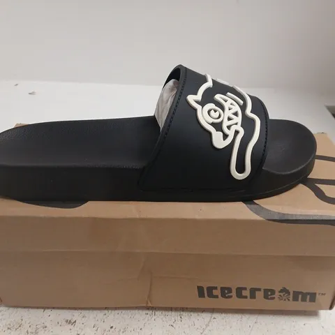 BOXED PAIR OF ICECREAM RUNNING DOG SLIDERS β BLACK, UK 9