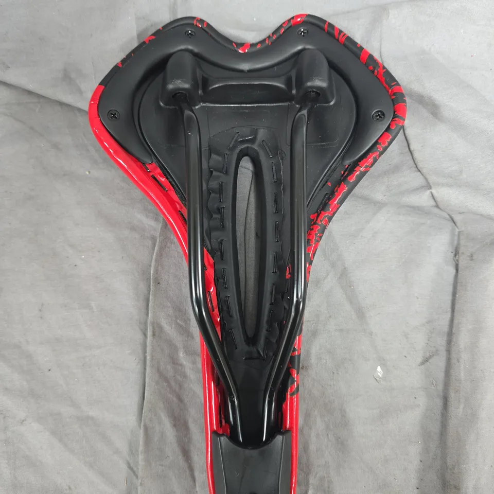 RED AND BLACK SPORT BICYCLE SADDLE WITH CENTRAL CUT-OUT