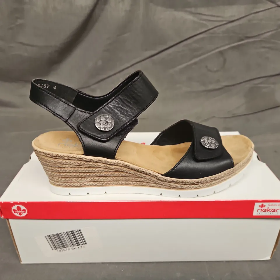 BOXED PAIR OF WOMENS RIEKER BLACK STRAP WEDGE SANDALS - UK SIZE 41