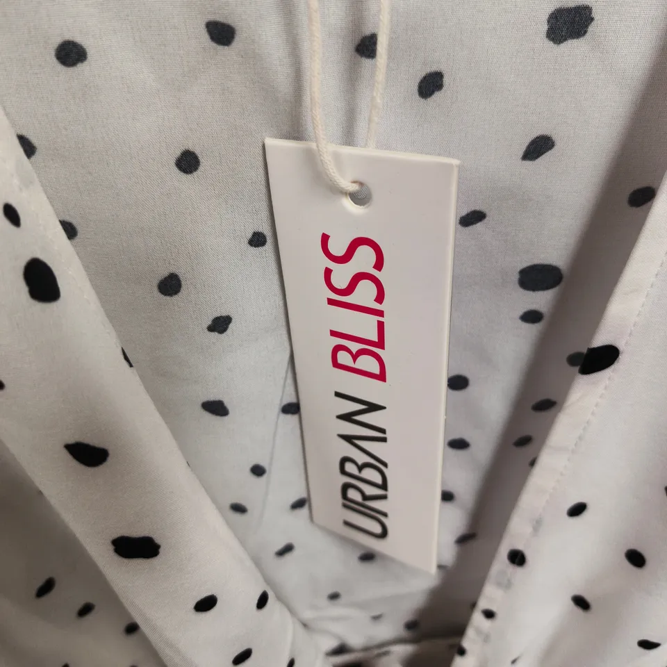 BOX OF APPROXIMATELY 90 URBAN BLISS WOMEN'S WHITE POLKA DOT WRAP BLOUSE - SIZES 8 / 10 /12 / 14 / 16 