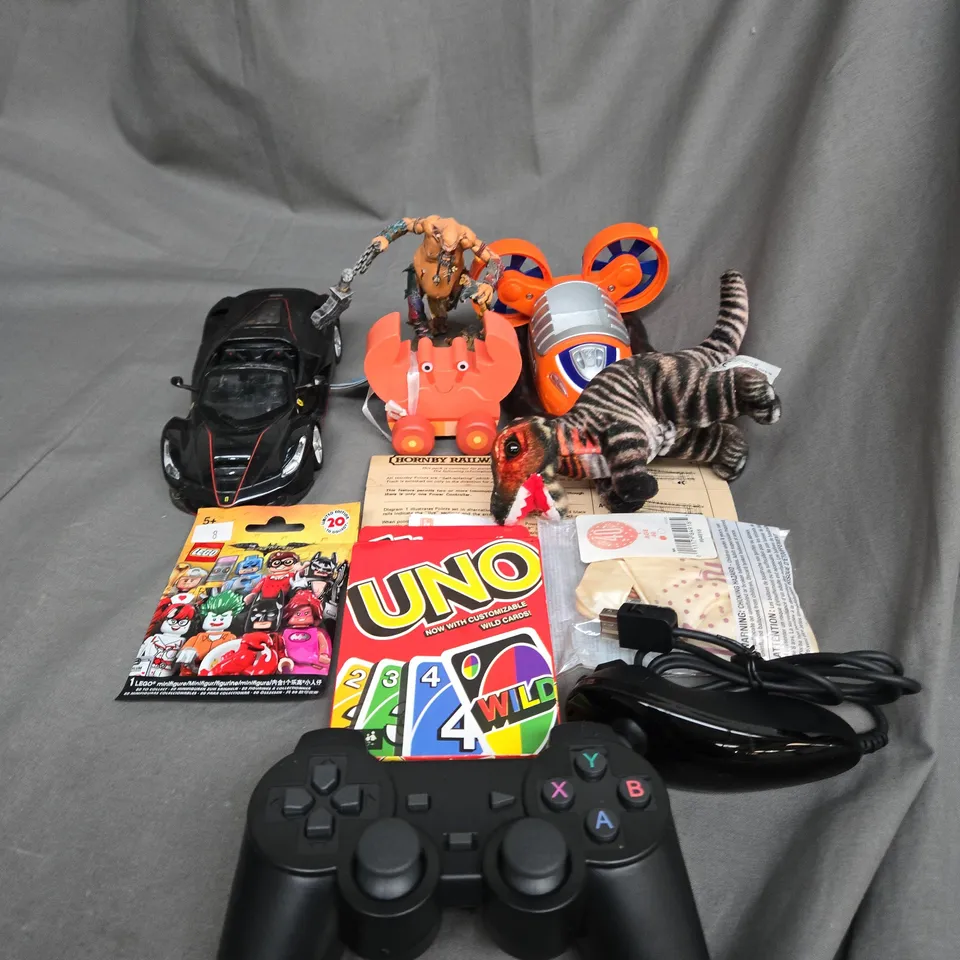 APPROXIMATELY 10 ASSORTED TOYS AND GAMES TO INCLUDE UNO, MODEL CAR AND BALLOONS