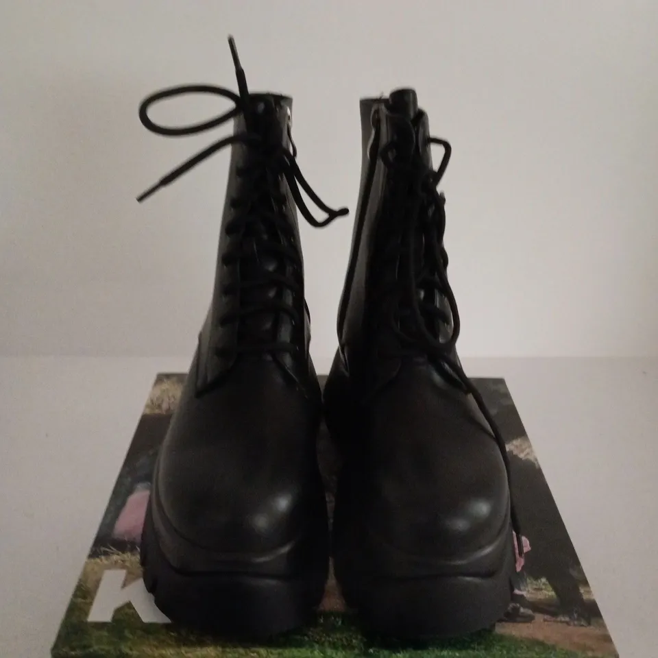 BOXD PAIR OF KOI RANCOR VILUN BLACK LACE-UP BOOTS, UK SIZE 6