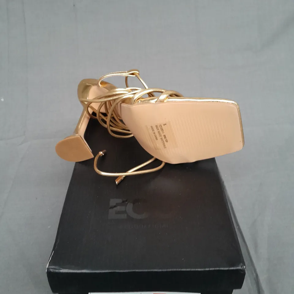 BOXED PAIR OF EGO GOLD HEEL RING TOP SIZE UK 5