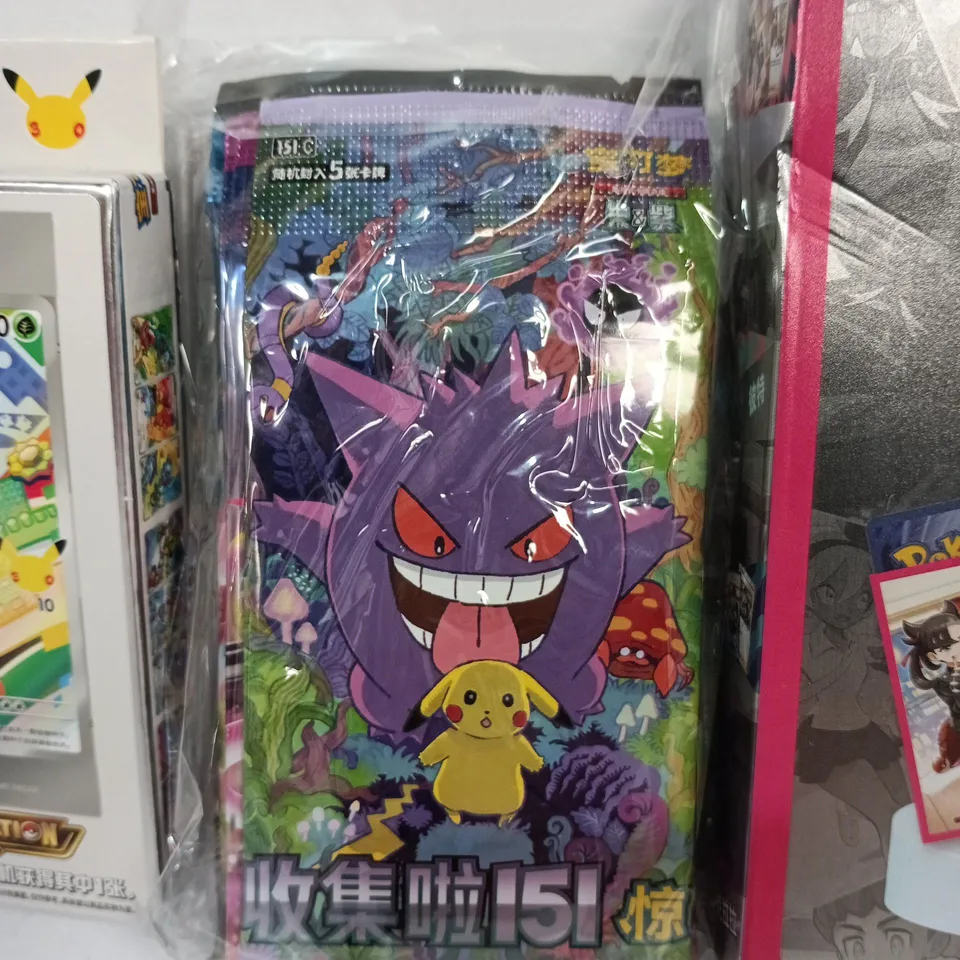 LOT OF 4 MULTI-PACKS OF NON-ENGLISH POKEMON CARDS
