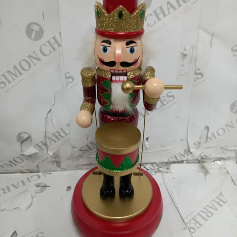 BOXED FESTIVE 32CM WOODEN ANIMATED MUSICAL NUTCRACKER