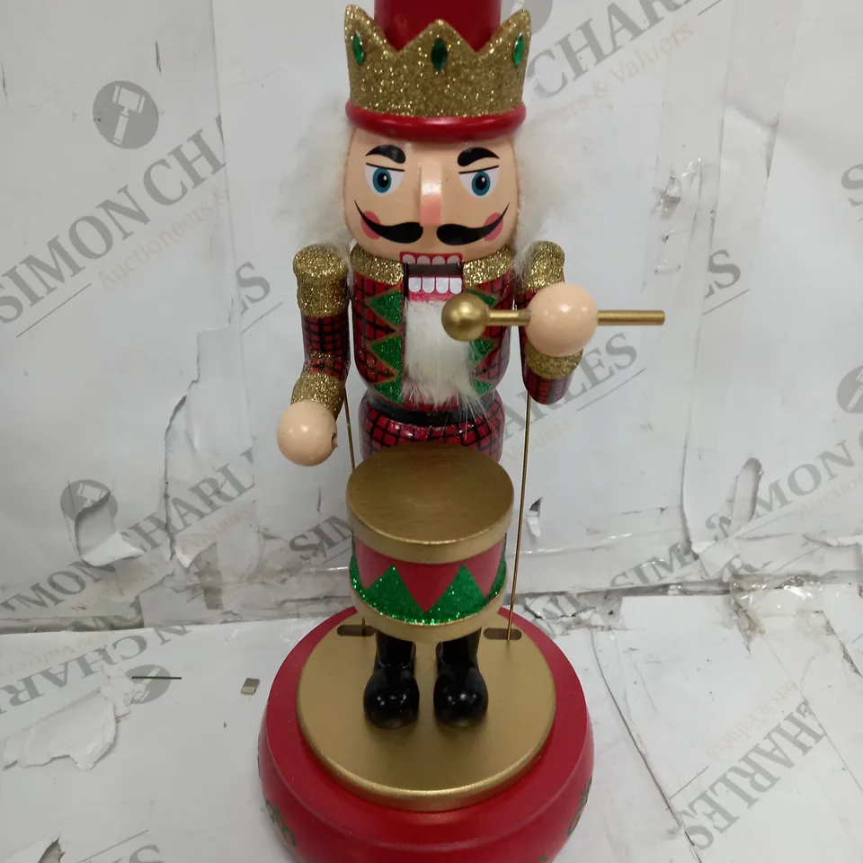 BOXED FESTIVE 32CM WOODEN ANIMATED MUSICAL NUTCRACKER