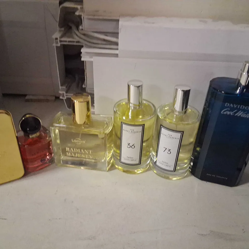 APPROXIMATELY TWELVE ASSORTED UNBOXED FRAGRANCES TO INCLUDE; FRENCH AVENUE, THE SCENT RESERVE AND PACO RABANNE