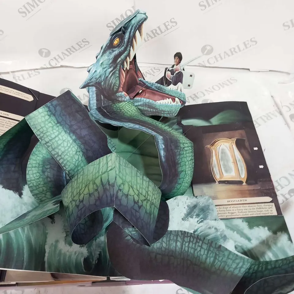 APPROXIMATELY 50 FROM THE FILMS OF HARRY POTTER A POP-UP GUIDE TO THE CREATURES OF THE WIZARDING WORLD 