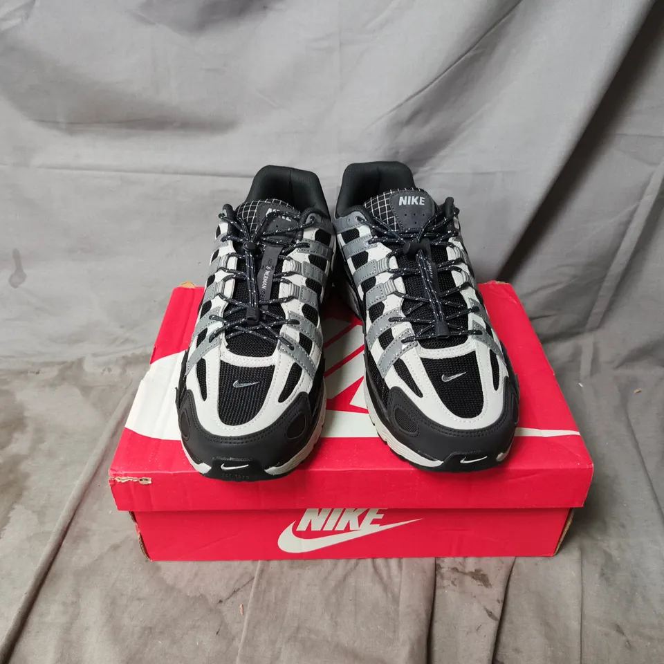 BOXED PAIR OF NIKE P-6000 TRAINERS IN GREY - UK 9