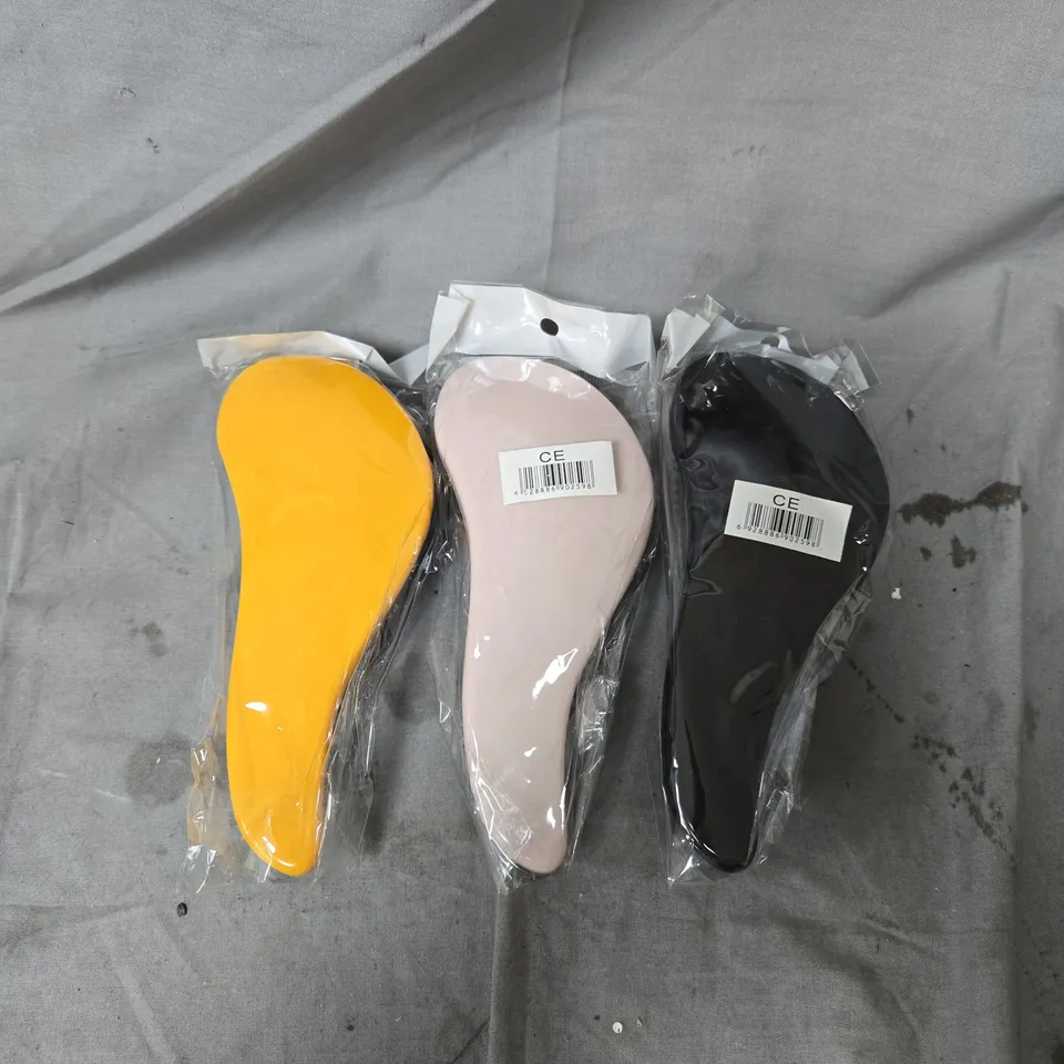 BOX OF APPROXIMATELY 50 HAIRBRUSHES IN ASSORTED COLOURS