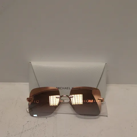 MICHAEL KORS SUNGLASSES – ROSE GOLD RIM, BROWN GRADIENT LENSES