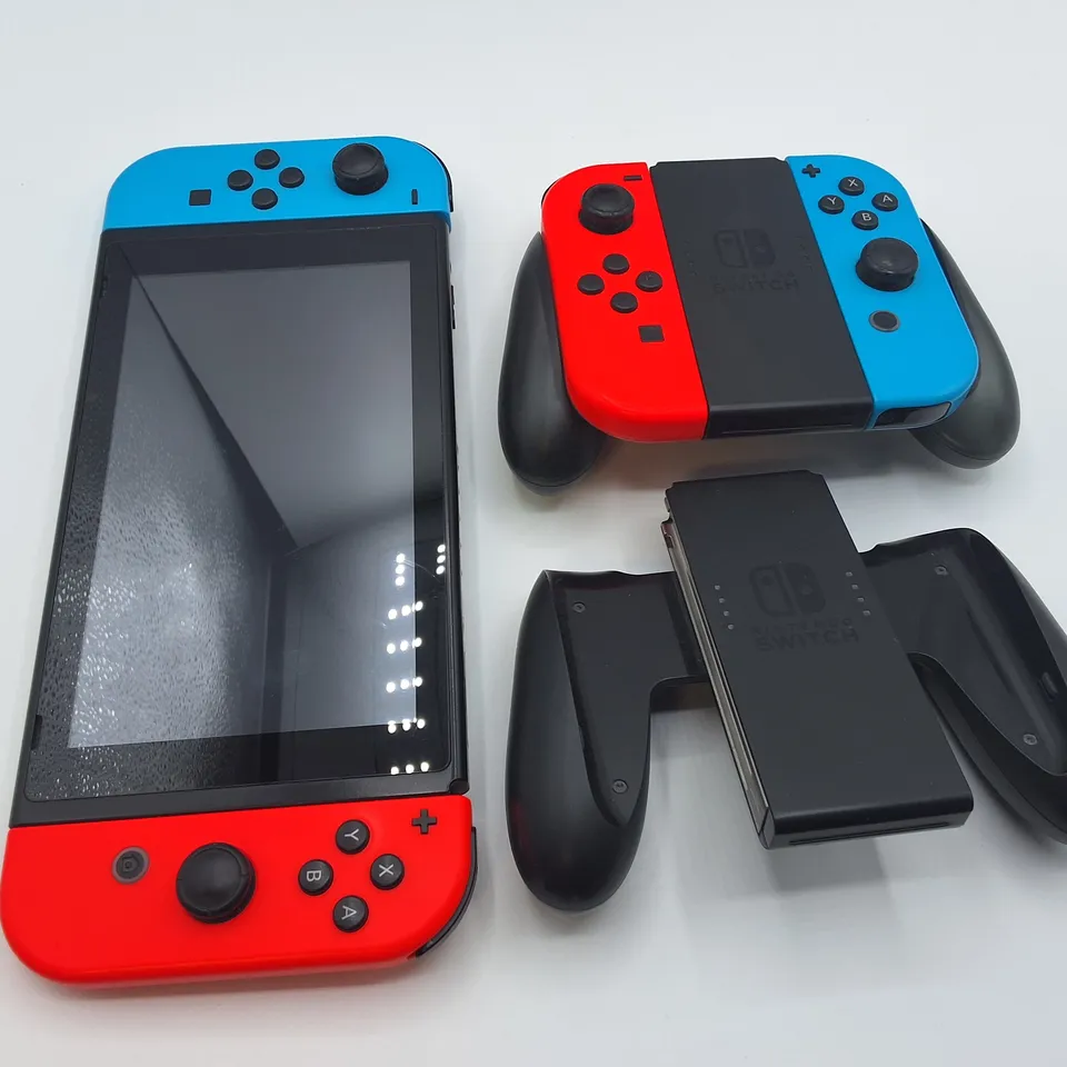 UNBOXED NINTENDO SWITCH WITH DOCK, ACCESSORIES AND EXTRA JOY-CON CONTROLLERS