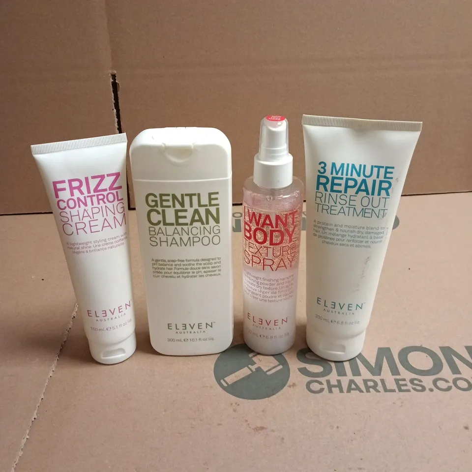 BOX OF APPROXIMATELY 25 ELEVEN HAIRCARE PRODUCTS TO INCLUDE 3 MINUTE REPAIR TREATMENT, GENTLE CLEAN BALANCING SHAMPOO AND I WANT BODY TEXTURE SPRAY