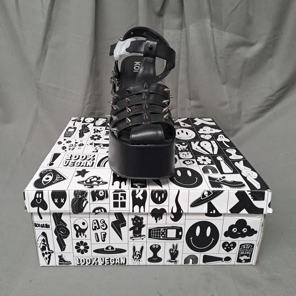 BOXED PAIR OF KOI VEGAN ANGEL MIST PLATFORM HEELS IN BLACK UK SIZE 6