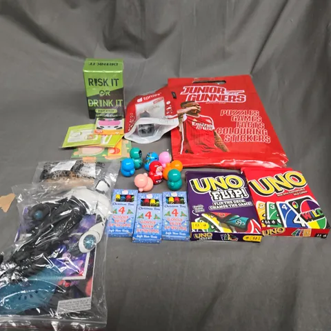 APPROXIMATELY 10 ASSORTED TOYS AND GAMES TO INCLUDE UNO, WAX CRAYONS AND CARD GAMES