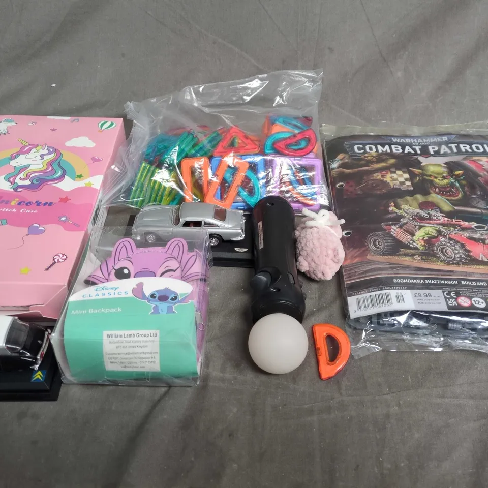 APPROXIMATELY 10 ASSORTED TOYS & GAMES PRODUCTS TO INCLUDE WARHAMMER, MODEL CARS AND STITCH