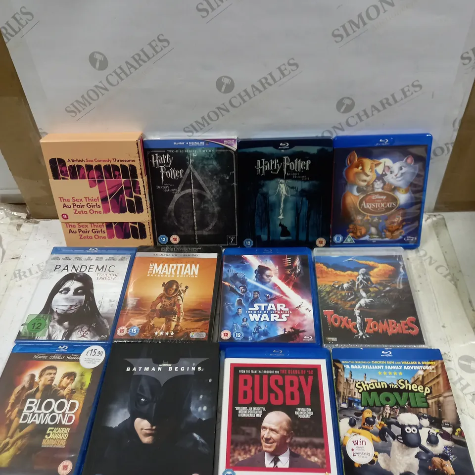 LOT OF APPROX 20 DVD'S TO INCLUDE HARRY POTTER, BATMAN BEGINS AND STAR WARS