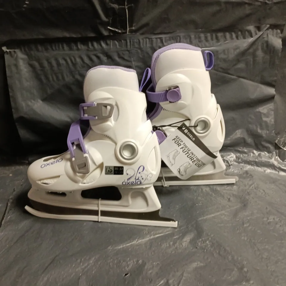 UNBOXED PAIR OD OXELO ICE SKATING BOOTS IN WHITE/PURPLE - UK 11.5C - 13C