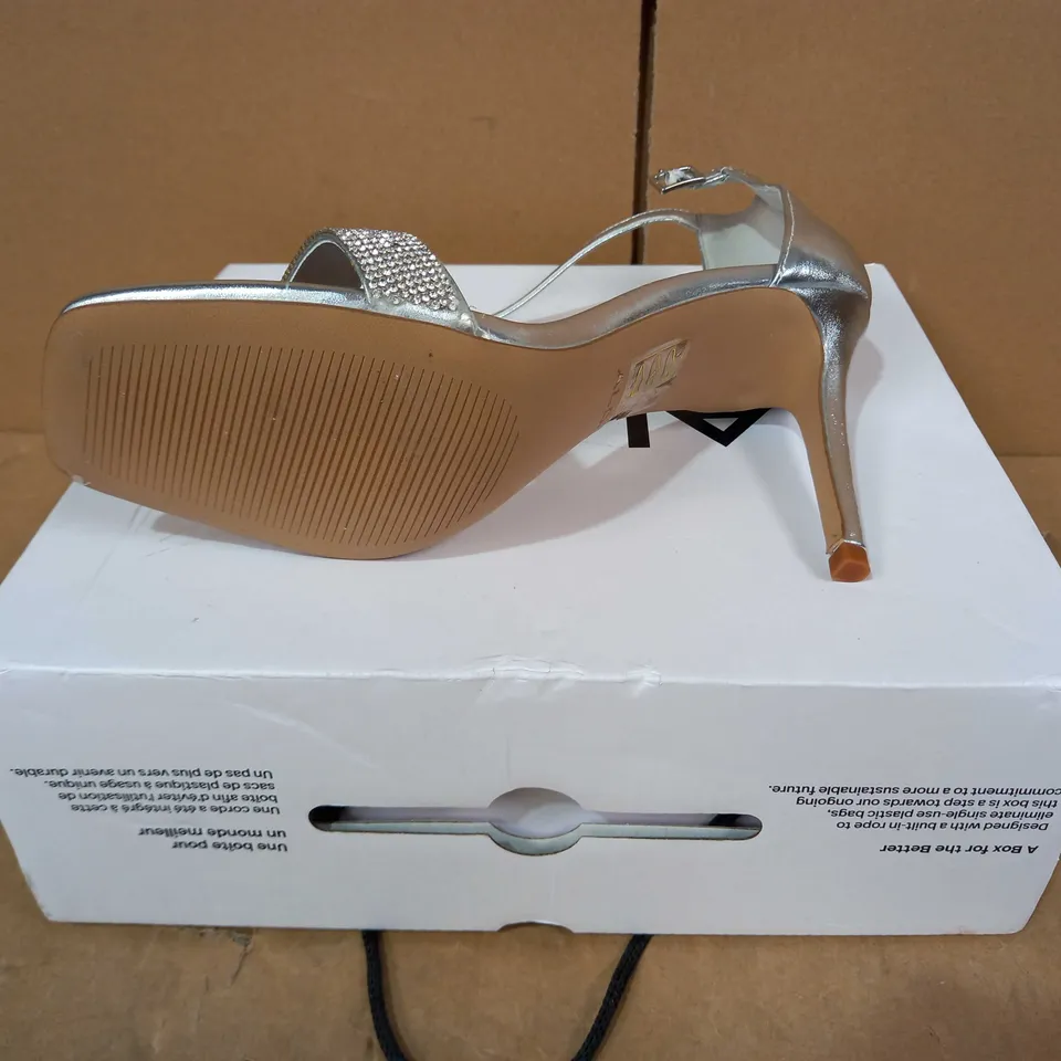 BOXED PAIR OF ALDO HEELS IN SILVER COLOUR WITH JEWEL EFFECT UK SIZE 7