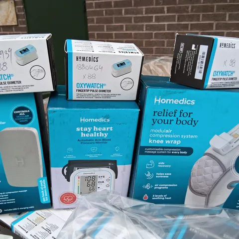 PALLET OF APPROXIMATELY 130 ASSORTED HOMEDICS PRODUCTS TO INCKUDE; OXYWATCH, AUTOMATIC ARM BLOOD PRESSURE MONITOR, MODULAR COMPRESSION SYSTEM KNEE WRAP AND MODULAR COMPRESSION UNIVERSAL COBTROLLER