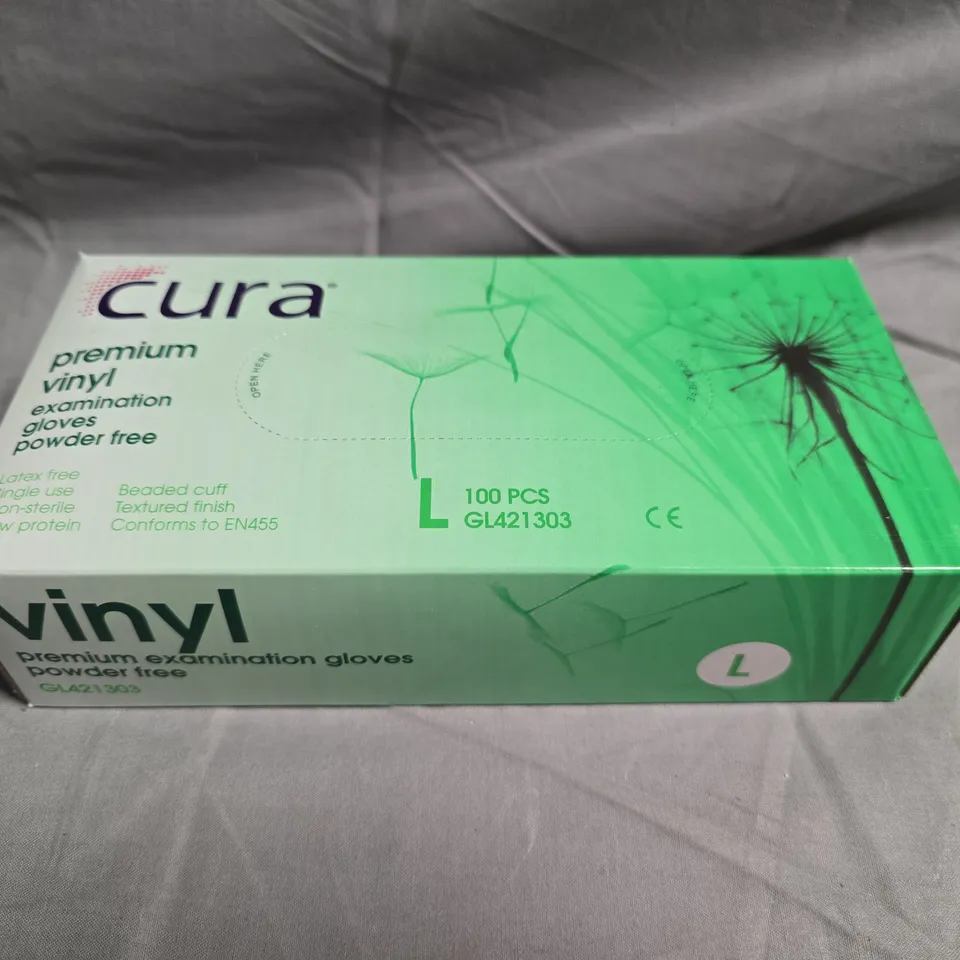 BOX OF APPROXIMATELY 10 PACKS OF CURA VINYL PREMIUM EXAMINATION GLOVES – POWDER FREE, SIZE L (100 PCS PER PACK)