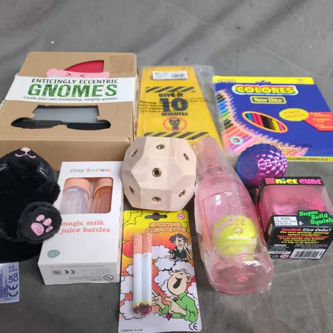 APPROXIMATELY 10 ASSORTED TOYS & GAMES PRODUCTS TO INCLUDE COLOURING PENCILS, TEDDIES AND MAGIC BOTTLES