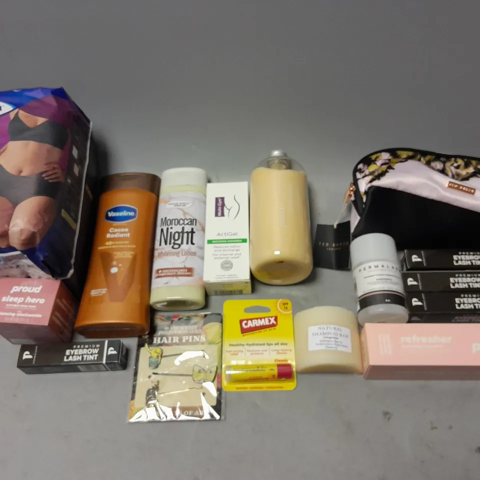 BOX OF APPROXIMATELY 15 COSMETIC ITEMS TO INCLUDE TENA HIGH WAIST UNDERWEAR, SKINPROUD REFRESHER, AND CARMEX LIP BALM ETC. 