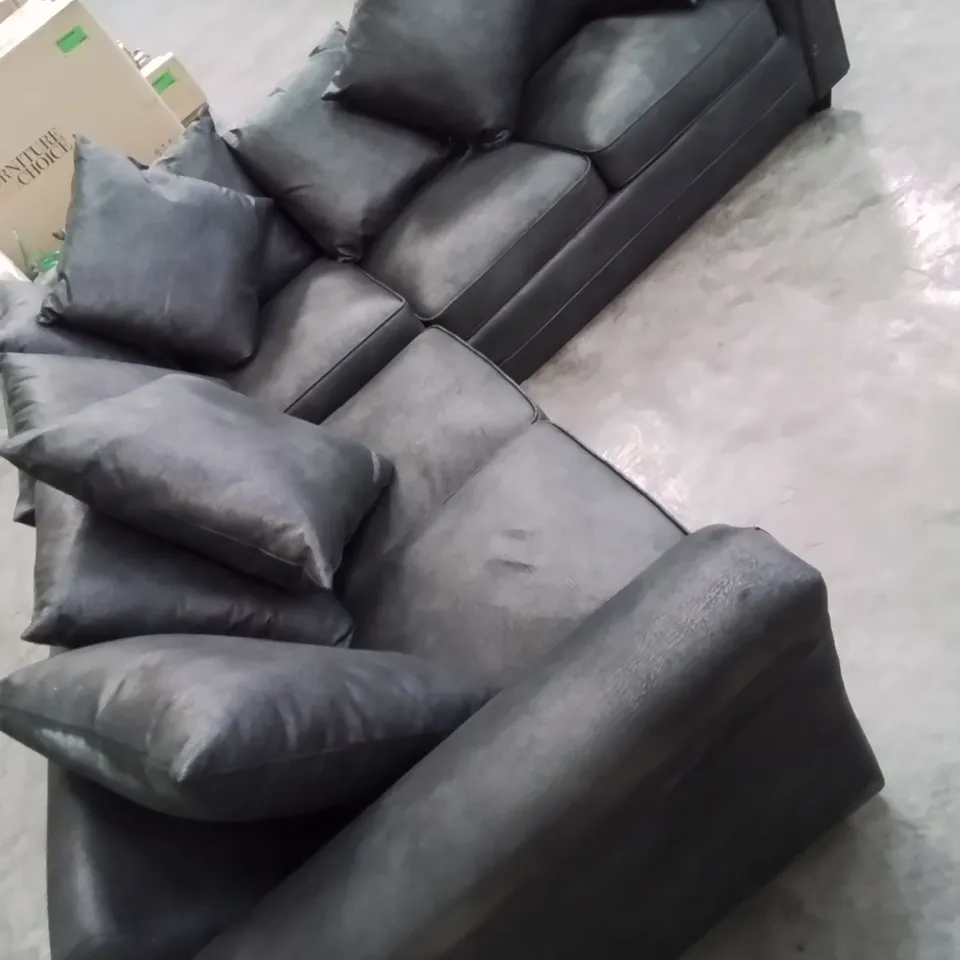 DESIGNER LEATHER LOOK FABRIC UPHOLSTERED CORNER SOFA IN BLACK HEAVILY DAMAGED AT REAR OF FRAME