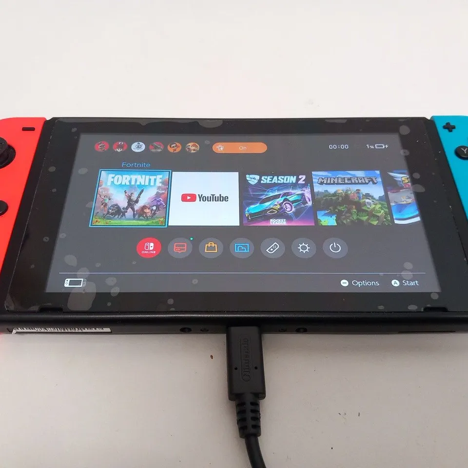 NINTENDO SWITCH HANDHELD GAMES CONSOLE