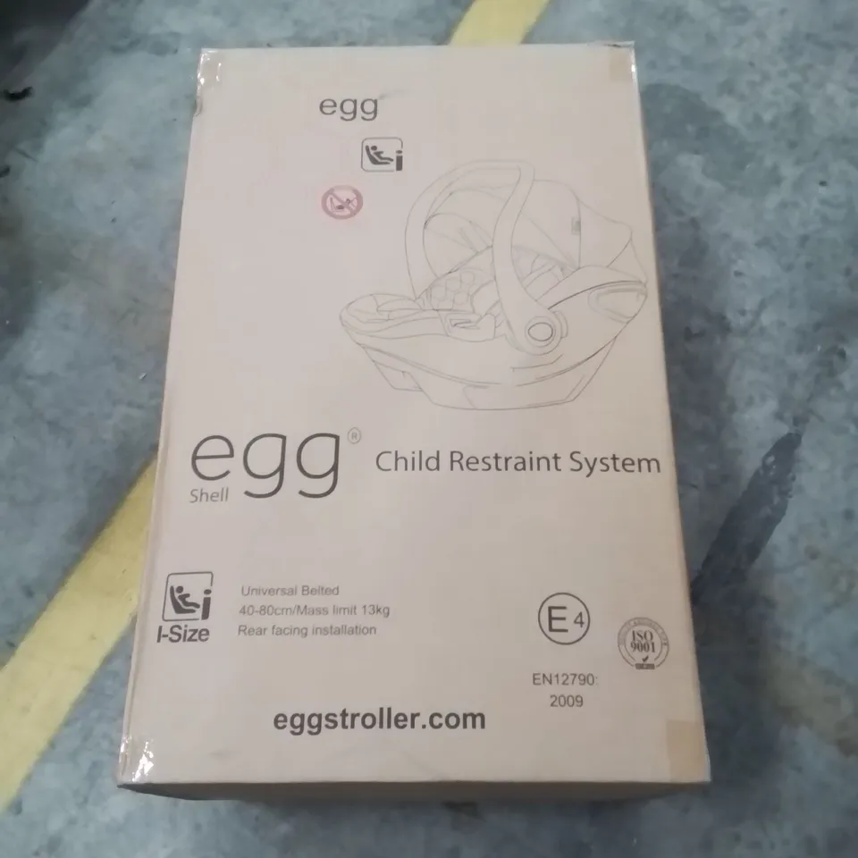 BOXED EGG SHELL CHILD CAR SEAT
