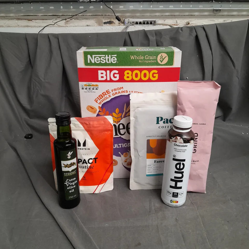 28 ASSORTED FOOD ITEMS TO INCLUDE NESTLE CHEERIOS , PACT COFFEE, EXTRA VIRGIN OLIVE OIL, CREATINE POWDER, HUEL FOOD DRINK AND GRIND HOUSE BLEND COFFEE - COLLECTION ONLY