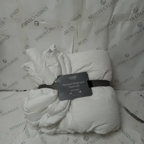 boxed COZEE HOME TEXTURED STRIPE AND SUPERSOFT BEDSPREAD - 250 BY 260CM