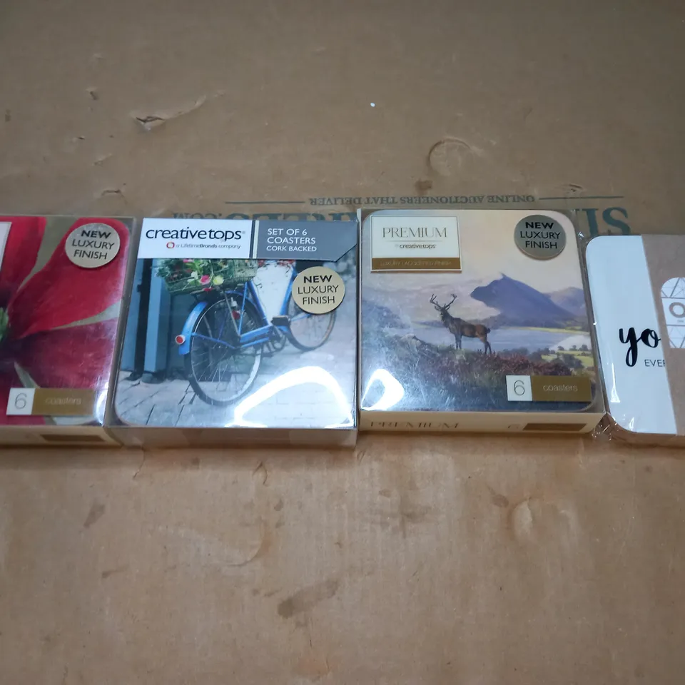 BOX OF APPROXIMATELY 15 CREATIVE TOPS CORK BACKED COASTER PACKS IN ASSORTED DESIGNS 