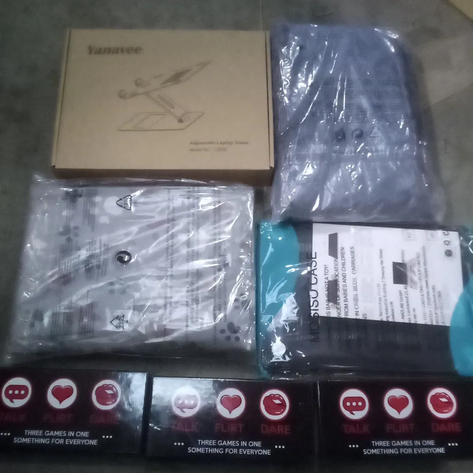 PALLET OF ASSORTED ITEMS INCLUDING LAPTOP STANDS , DOG COOLING PADS , COZY THROWS , ETC 