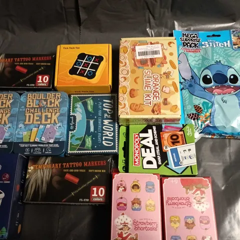 ASSORTED CHILDREN'S TOYS & GAMES BUNDLE β MONOPOLY DEAL, STITCH BAG, TATTOO MARKERS & MORE