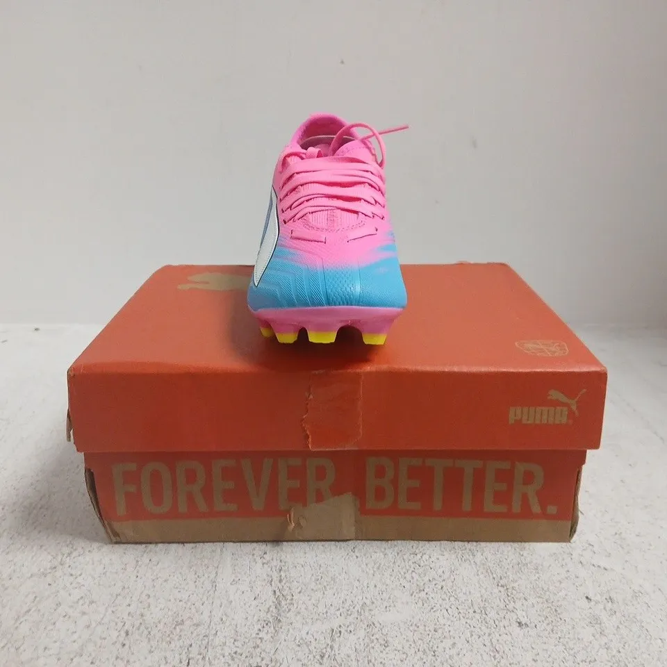 BOXED PAIR OF PUMA JUNIOR ULTRA 6 MATCH FIRM GROUND FOOTBALL BOOTS IN PINK/BLUE/ORANGE SIZE UK 1