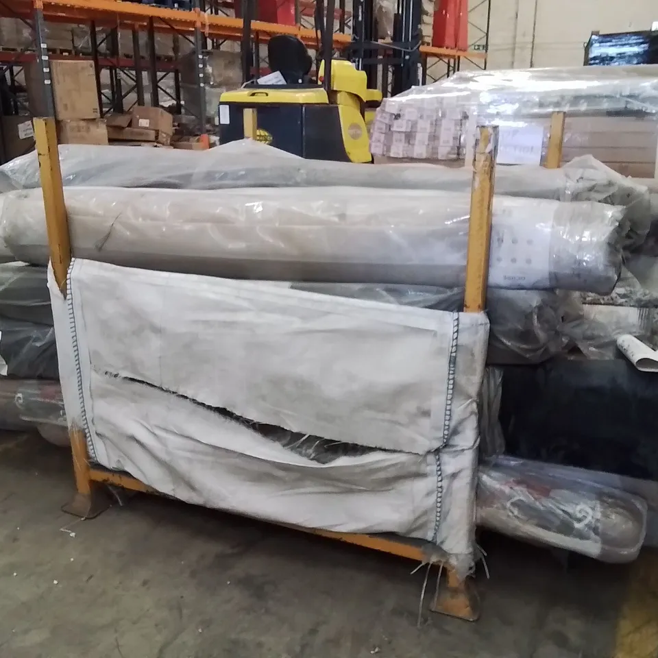 STILLAGE OF APPROXIMATELY 20 BAGGED QUALITY DESIGNER RUGS