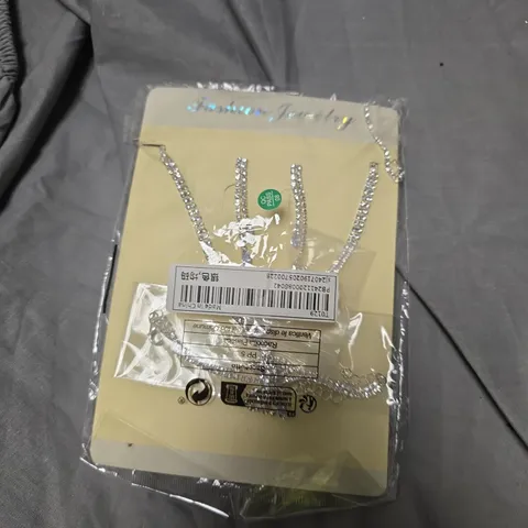 SILVER-TONE NECKLACE WITH MATCHING STUD EARRINGS ON BEIGE PRESENTATION CARD 