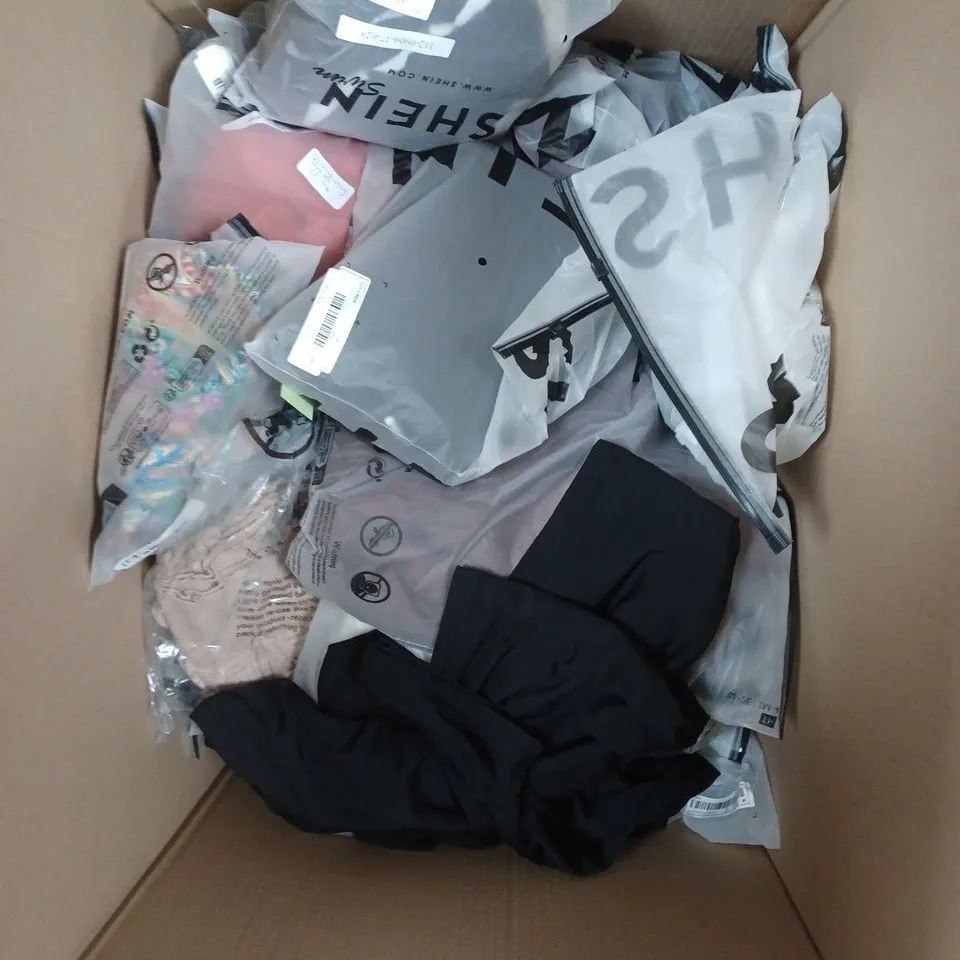 APPROXIMATELY 15 ASSORTED SHEIN CLOTHING PRODUCTS IN VARIOUS SIZES TO INCLUDE DRESSES, TOPS ETC 