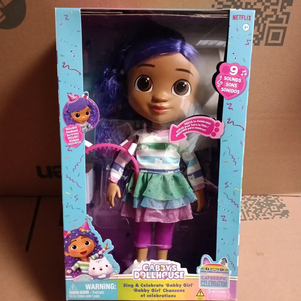 GABBY'S DOLLHOUSE GABBY GIRL FIGURE – PURPLE HAIR, RAINBOW DRESS, BOXED