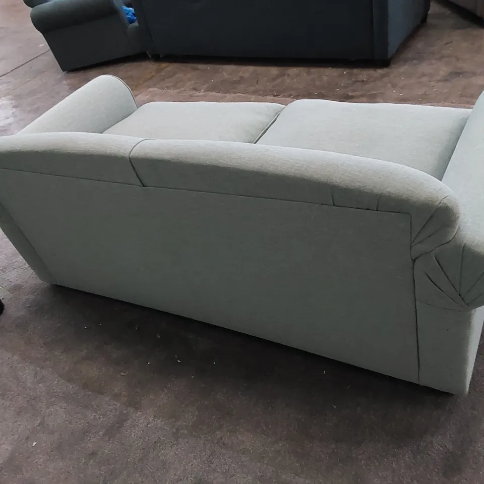 THE CHILMARK 3-SEATER SOFA UPHOLSTERED IN AQUA FABRIC