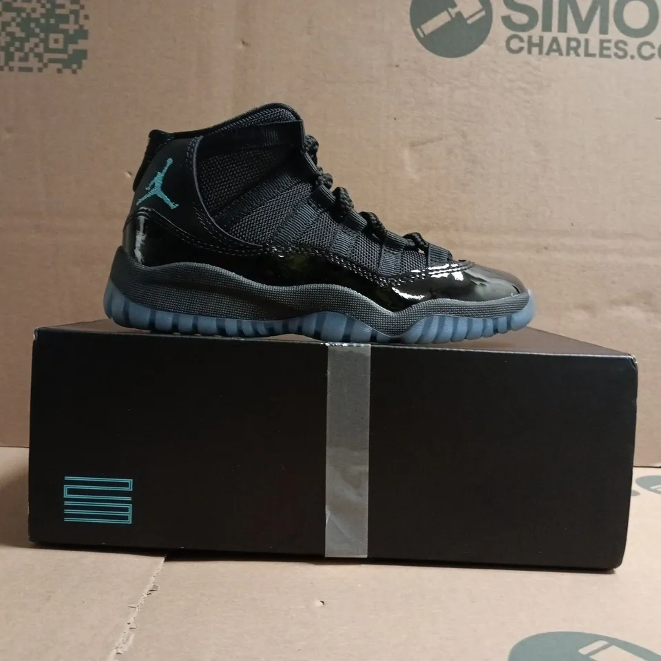 BOXED PAIR OF JORDAN 11 RETRO KID'S SHOES IN BLACK/BLUE SIZE UK 12