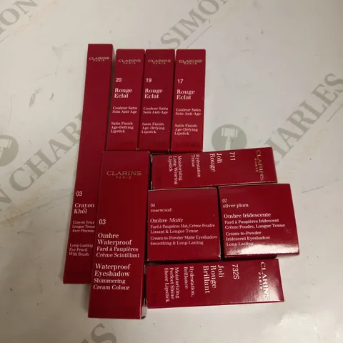 LOT OF APPROX 9 TO INCLUDE CLARINS IRIDESCENT EYESHADOW , CLARINS LIPSTICK , ETC