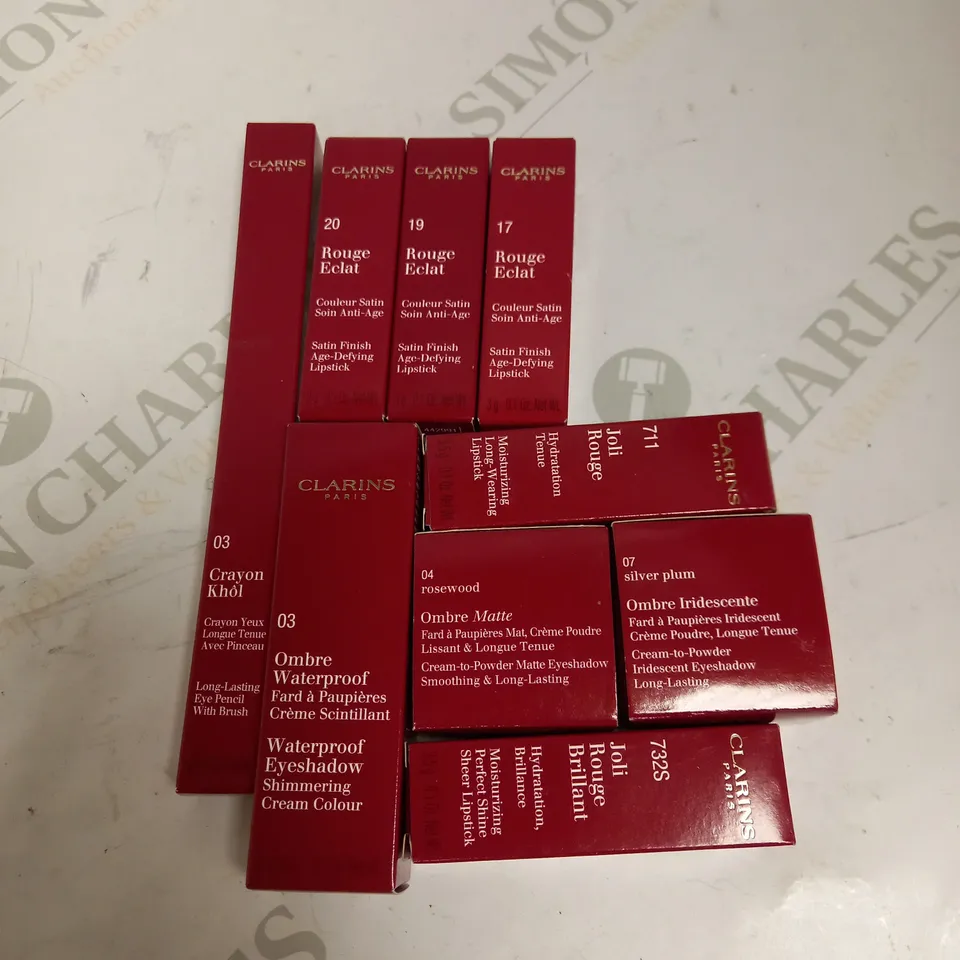 LOT OF APPROX 9 TO INCLUDE CLARINS IRIDESCENT EYESHADOW , CLARINS LIPSTICK , ETC