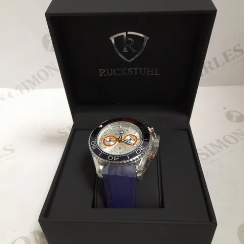 MEN’S RUCKSTUHL CHRONOGRAPH R400 WATCH – SILVER COLOUR CASE – SILVER DIAL – 3ATM WATER RESISTANT – BLUE RUBBER STRAP 